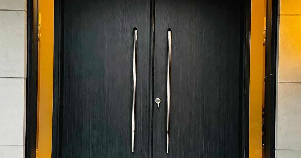 Front entry door on a home in Aurora, Ontario — winter latch adjustment
